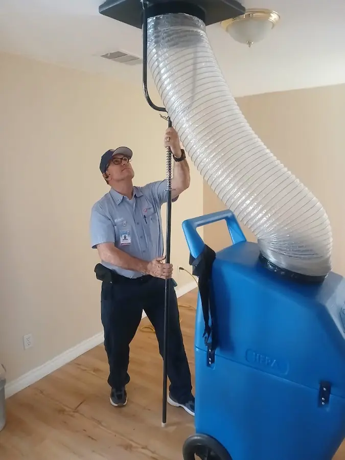 HVAC Installation technician using HEPA equipment in Clover